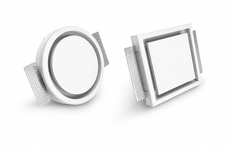ERGOVENT RONDO and KVADRO concealed diffusers shown side by side, round and square white models with perforated side vanes