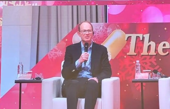 Michael Rabinowitz speaking at Asian conference.