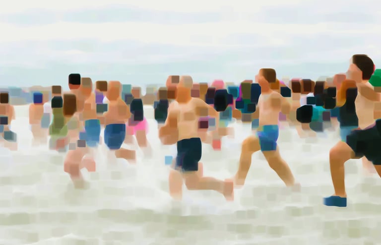 A group of people running in the water