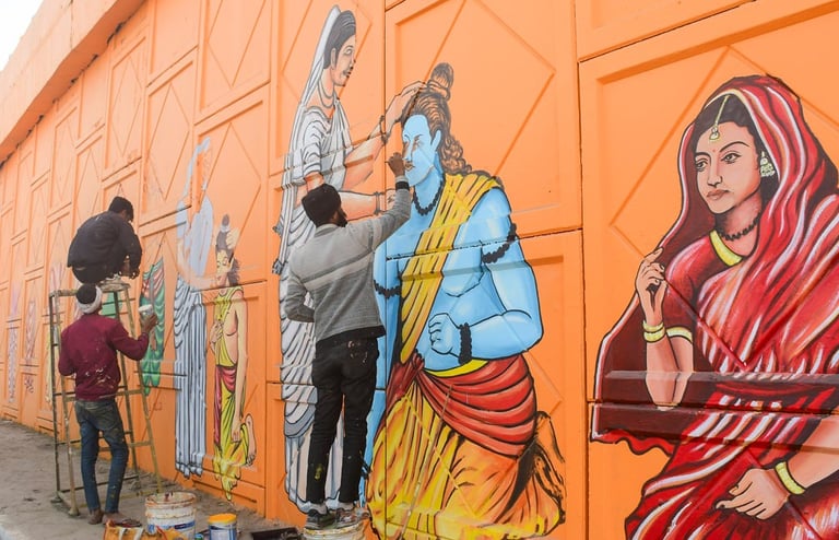a man is painting a mural of a woman's face