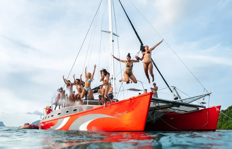 Private luxury yacht cruising through Bacuit Bay, El Nido.