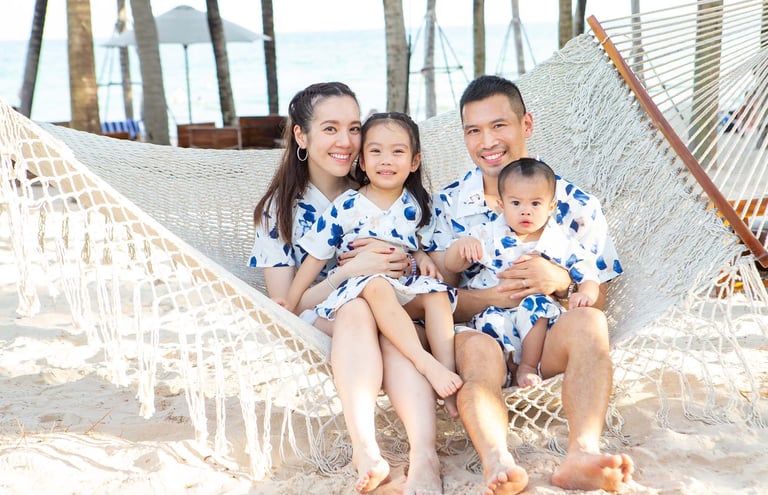 Family photoshoot on beach hammock in Phu Quoc