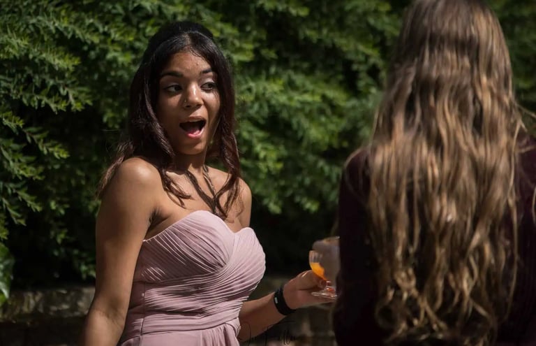 bridesmaid smiling after the wedding ceremony