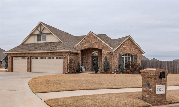 a house with a mailbox and mailbox in front of a house