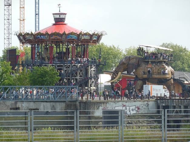 The giant mechanical Great Elephant and Marine Worlds Carousel at Les Machines de l'île in Nantes, France.