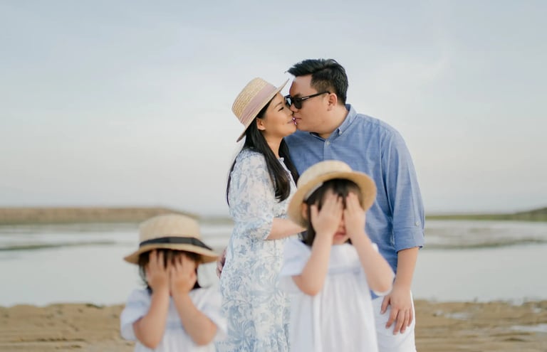 Candid family moments on the beach at The Apurva Kempinski Bali during golden hour