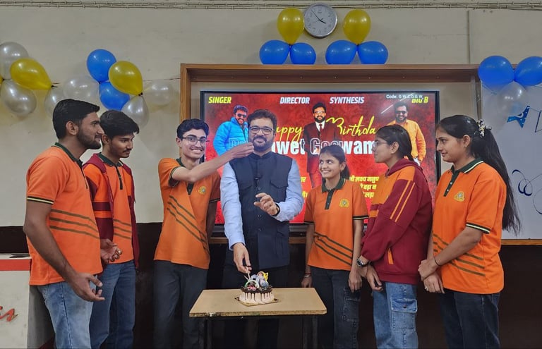 Mentor celebrating birthday with students in a decorated classroom.