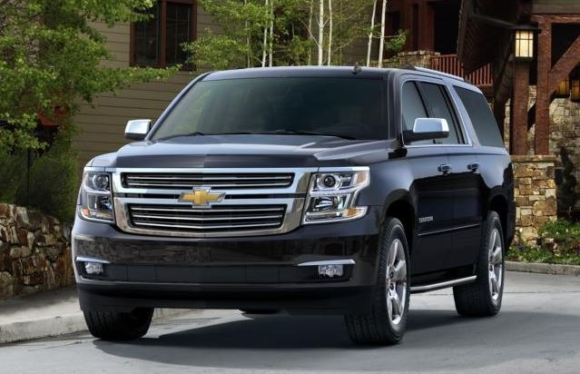 Black Chevy Suburban luxury SUV used for premium transportation services.