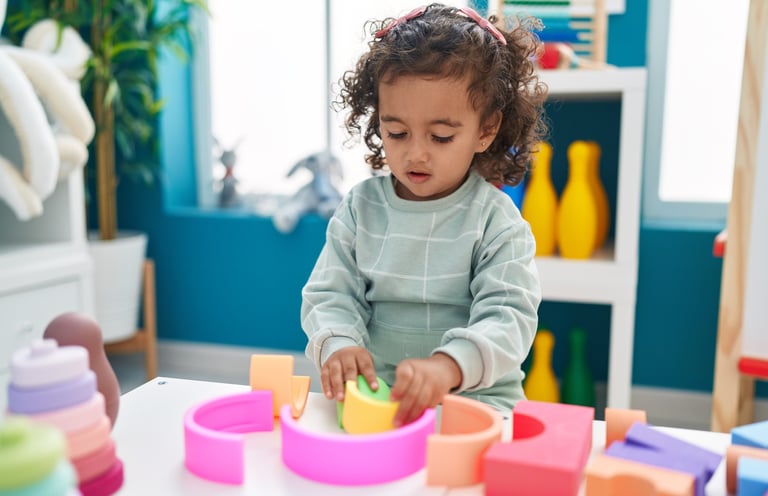 toddler playing with blocks
