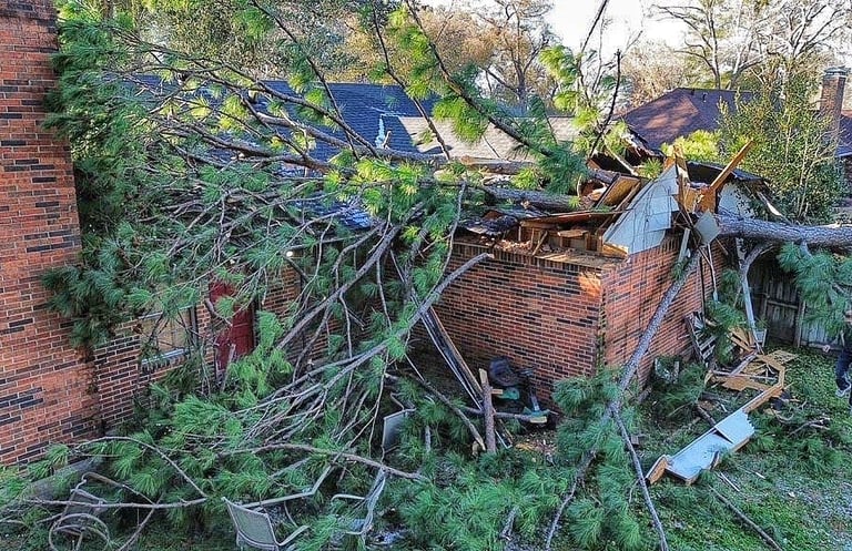 Storm knocked tree over customer's roof in Tyler, TX so we removed the tree and renovated home