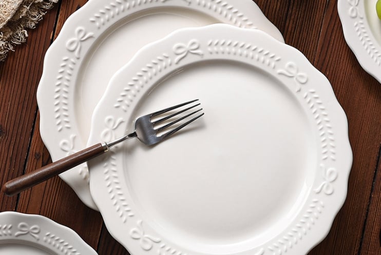 Two white ceramic plates