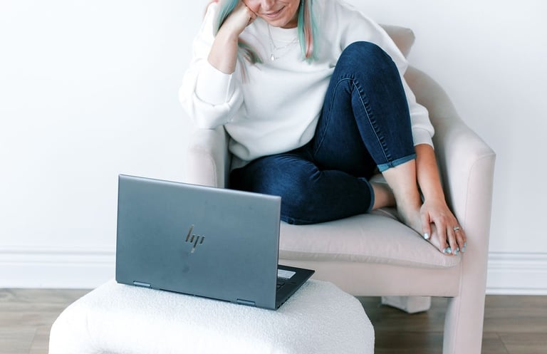 Tabitha with butterfly effect consulting with her laptop talking to a client