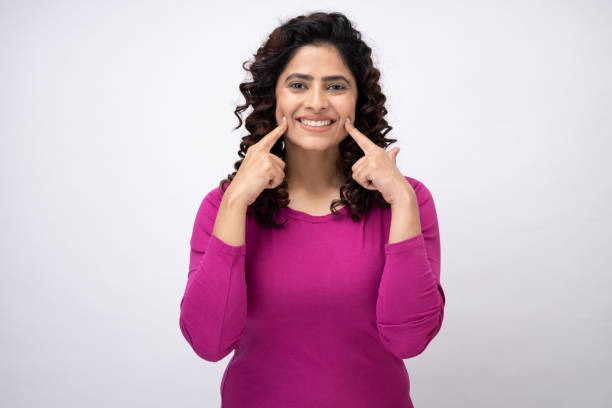 a smiling patient at white castle dental clinic katraj pune