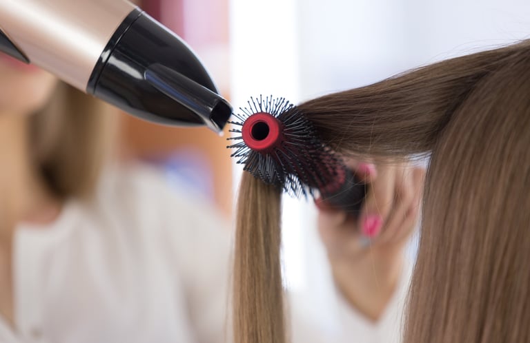 Hair model with voluminous blow-dry style