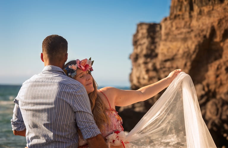 a man and woman standing next to each other