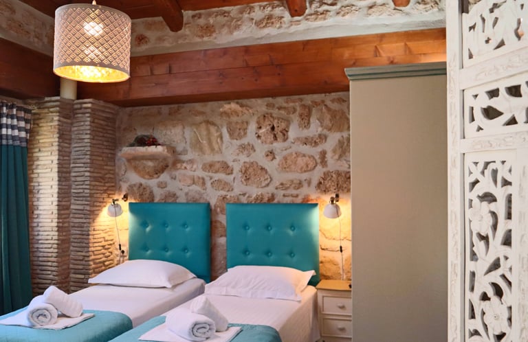 Twin beds of Loft area in Villa Galanoussa