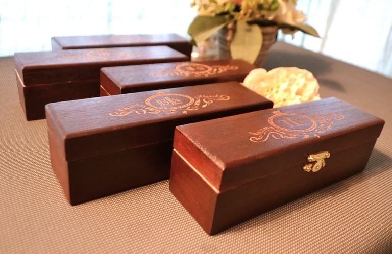 a bunch of wooden boxes with flowers in a vase
