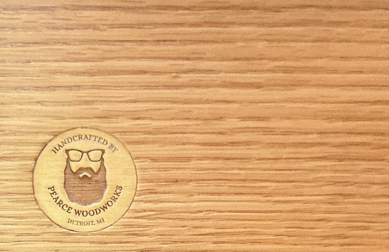 Solid oak with branded woodworker medallion showcasing handmade quality.