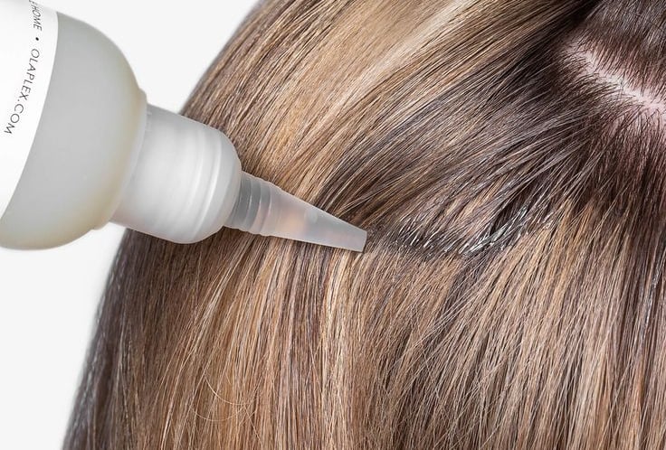 Hair model with Olaplex product