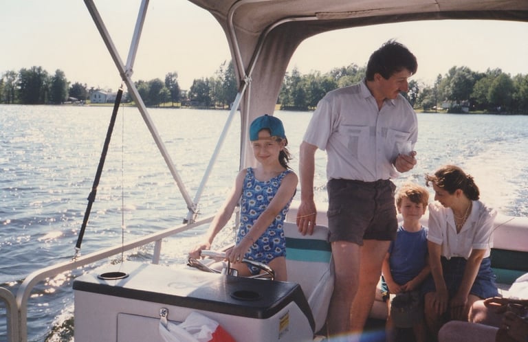 Childhood photo of Kinga boating on Lake Couchiching.
