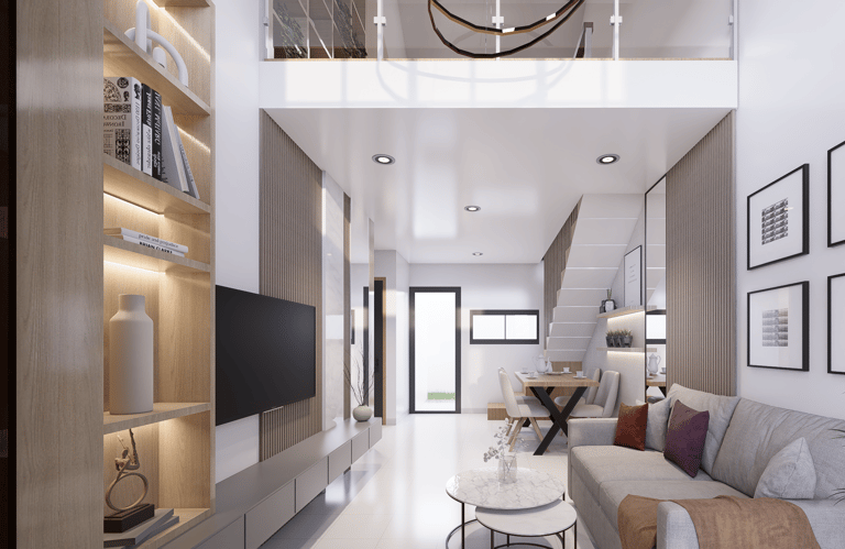 Interior ruang keluarga rumah Mezzanine Maharupa Village luas dan hangat