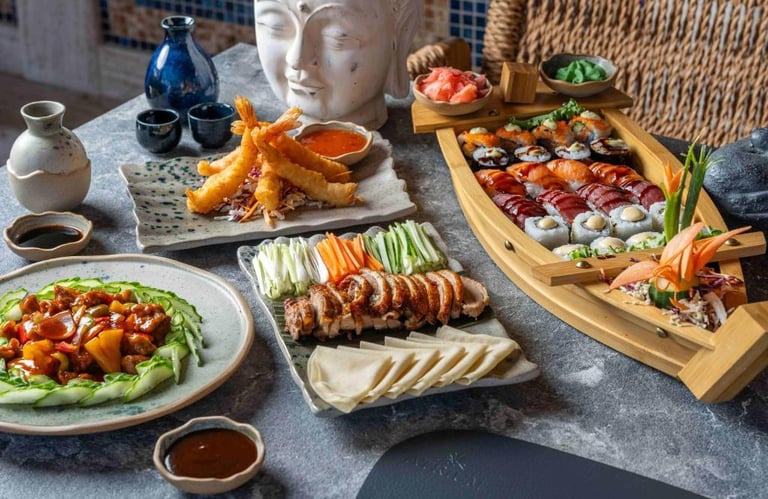 A gourmet Japanese sushi boat platter served with crispy Peking duck, shrimp tempura, and traditional sides.