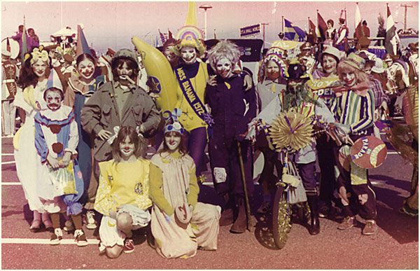 a group of people dressed in costumes and masks