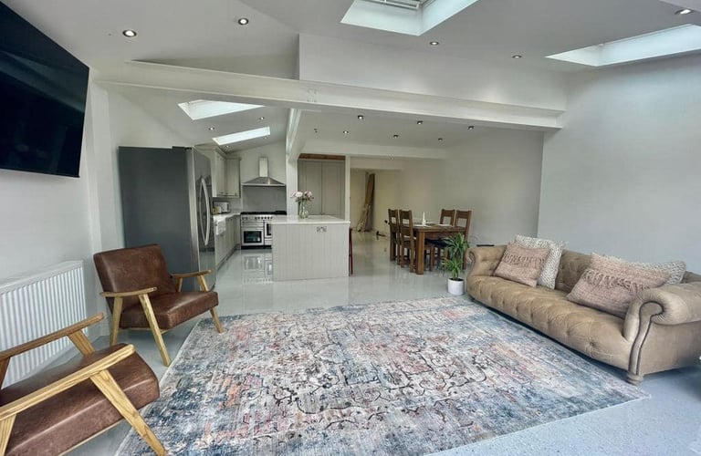 Loft conversion in Malvern featuring Velux windows and neutral interior