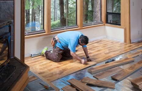 Floor installation with hardwood flooring by Uprise Renovation