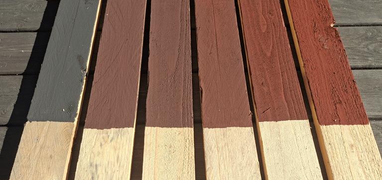 Exterior wood siding painted with breathable heritage barn paint