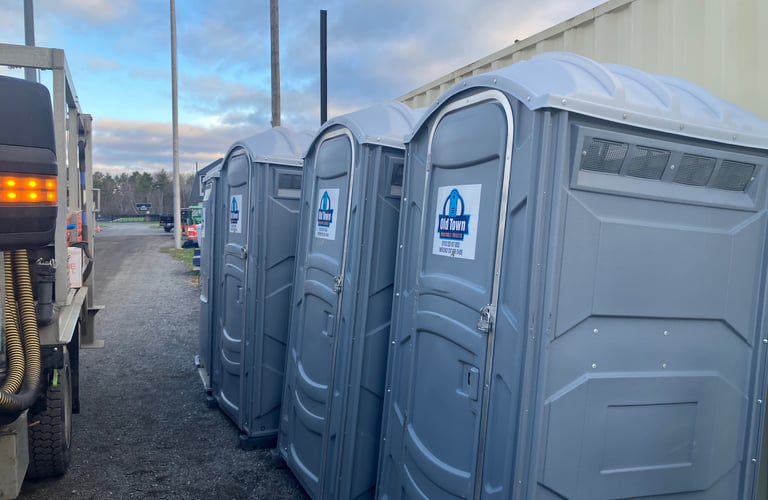 A row of portable toilets 