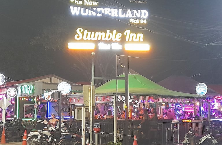 Street view of Wonderland bar complex and sign in Hua Hin