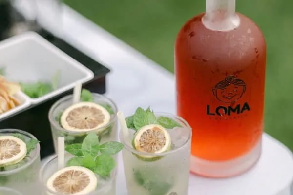 Fresh Loma mojito cocktails with hand-squeezed lime and mint at an outdoor wedding in HK..