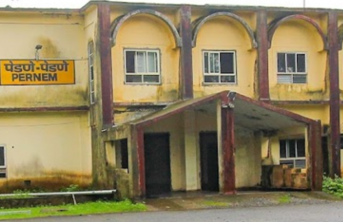 a pernem train station building with a sign that says, the name of the building is a pernem