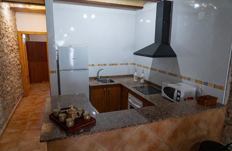 Cocina-comedor en la primera planta de Carmens Rural, Sant Jordi