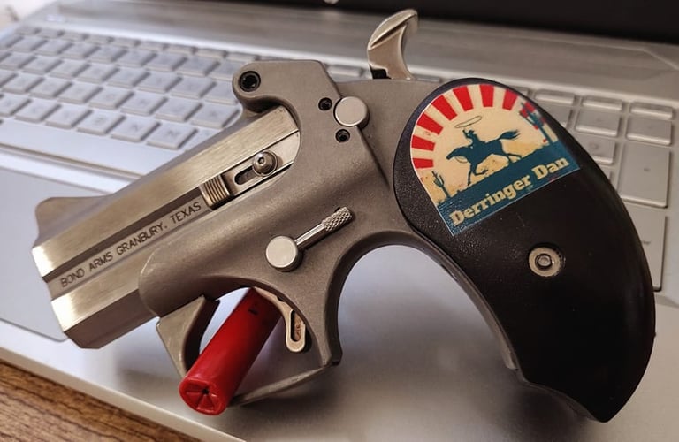 bond arms with Derringer Dan grip on a laptop