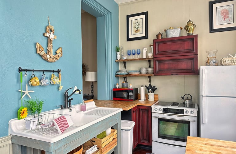 kitchen with farm style sink and white appliances 2123 rivermont apartments