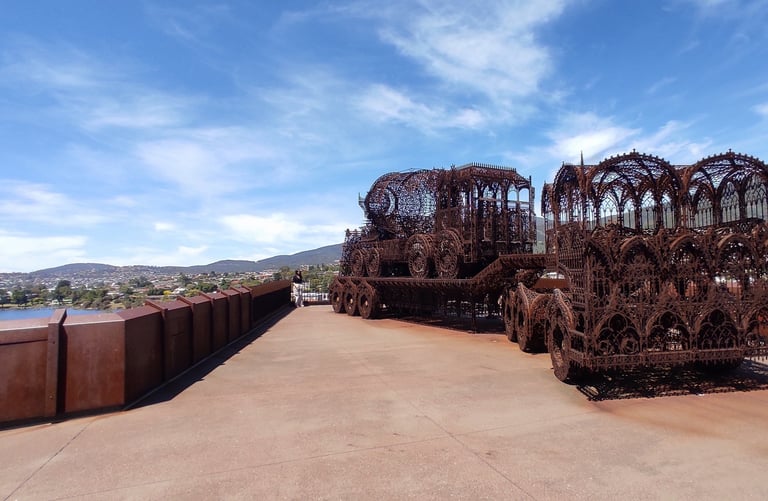 metal fram carriage scuplture in Hobart in the museum MONA