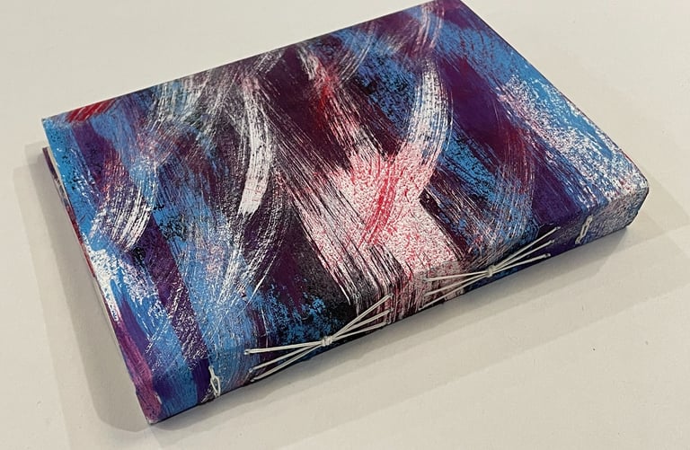 Soft cover journal with decorated spine and link stitch