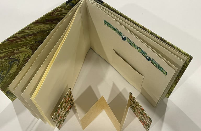 Album with marbled paper and decorative pages