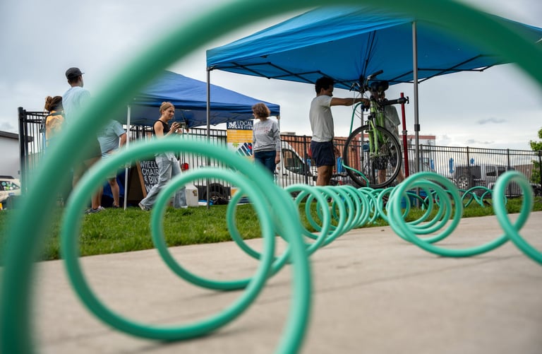 Close-up of the hose with the event in the background