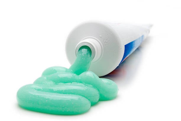 a toothpaste squeezed from the tube