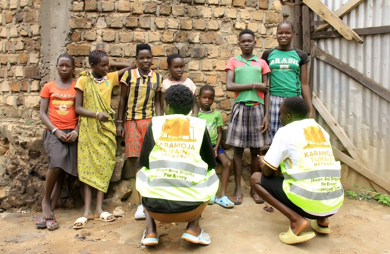 KTN staff engaging with the children in Katwe, Kampala.