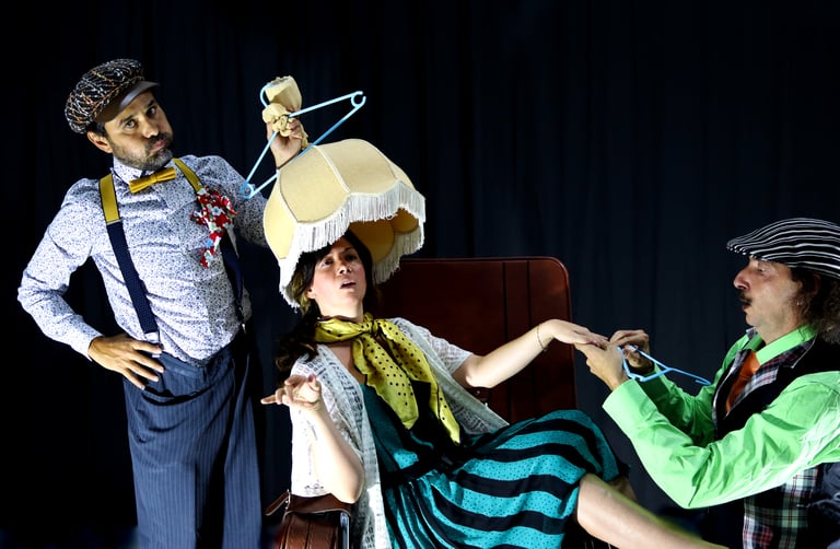 a man and woman in costumes on stage