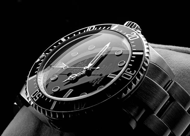 a watch with a black and white photo of a watch