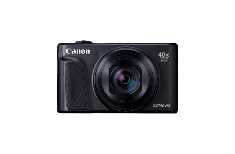 a canon camera with a lens attached to it
