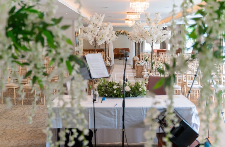 a wedding ceremony with a piano and music equipment