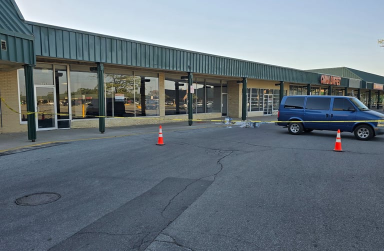 Prep, prime and repainting of storefront.