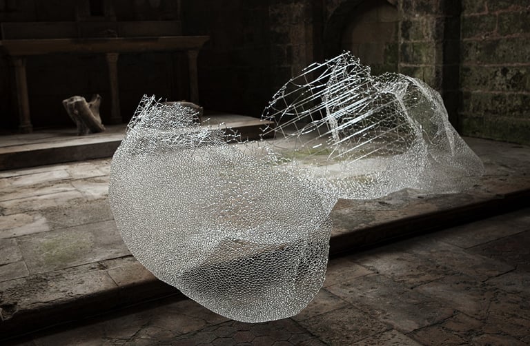 A big glass sculpture in a crypt
