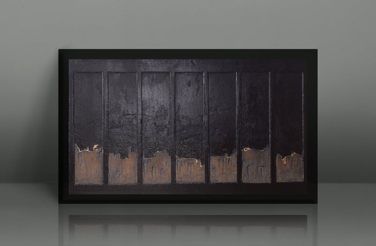 Minimalist black abstract wall art with textured vertical panels and metallic gold accents.